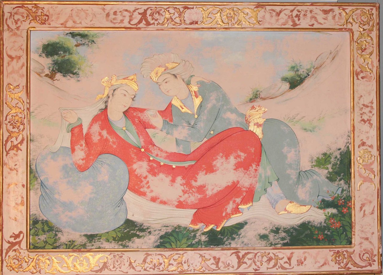 Persian miniature of two figures reclining in a pastoral setting with a decorative border
